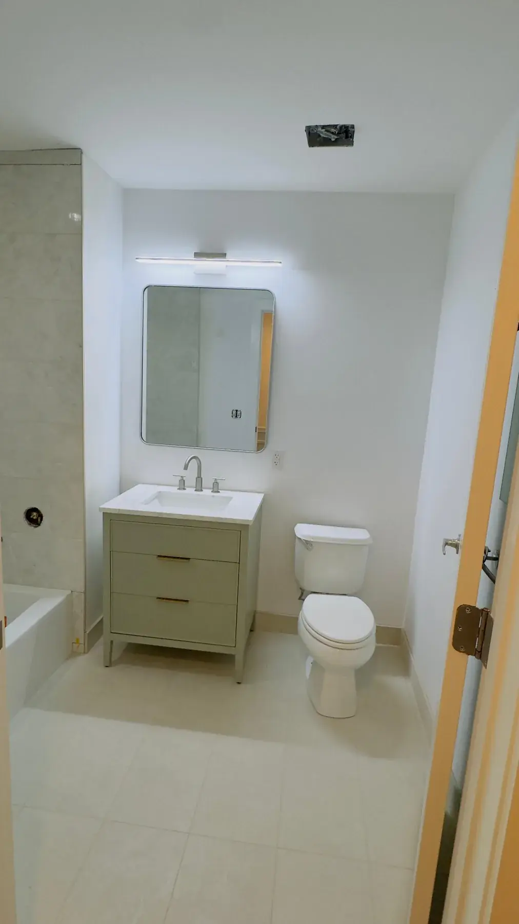 New vanity, mirror and lighting in the second bathroom