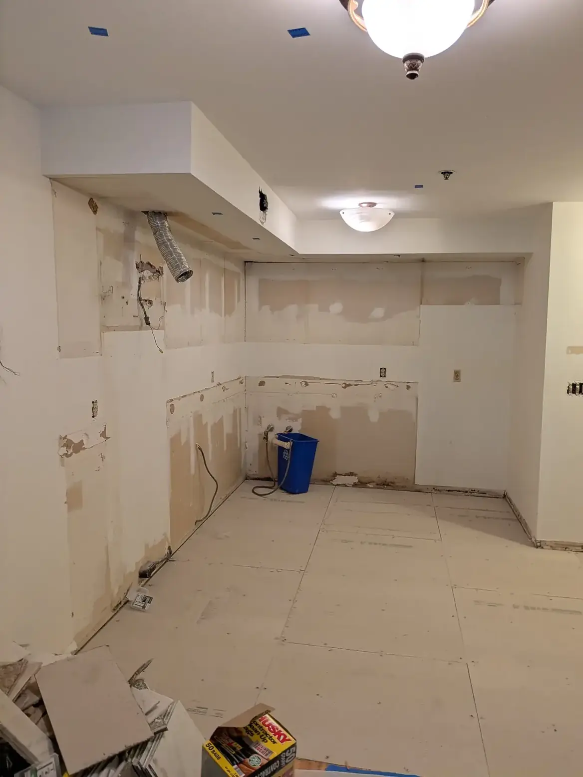 The kitchen stripped back to bare walls after demolition
